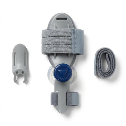 In the box: the splint, a clip-in big-toe plate and a strap