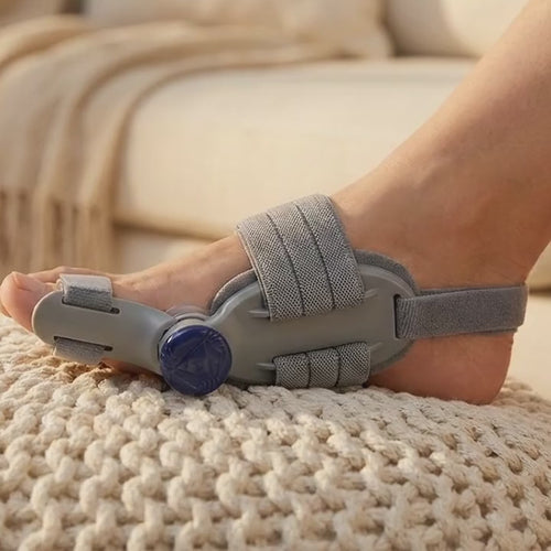 The Archwell splint worn at home, foot resting on an ottoman