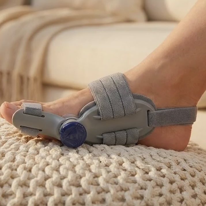 The Archwell splint worn at home, foot resting on an ottoman